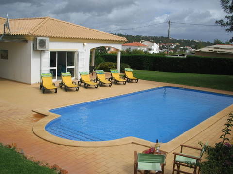 Sun beds by pool Sun beds by pool