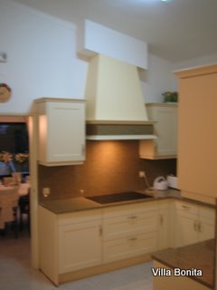 Kitchen view with ceramic hob Kitchen view with ceramic hob